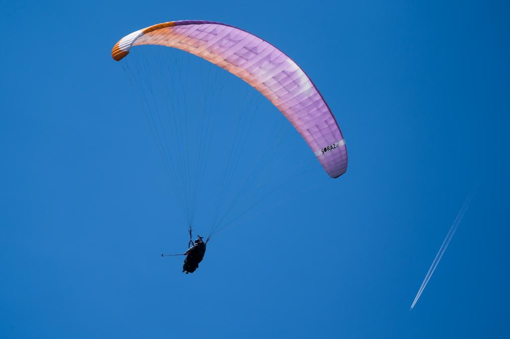 Paragliding over the Brenta Dolomites and Lake Molveno